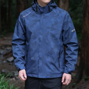 Men's blue pixel camo outdoor windbreaker jacket with hooded design and logo detail