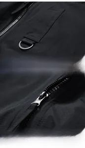 Detail view of durable ripstop fabric, metal D-ring hook, and premium metal zipper closure