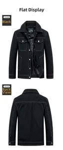 Detail view of black workwear jacket with distinctive white contrast stitching accents