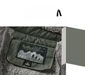Detail view of winter jacket inner grey fleece lining and waterproof collar label