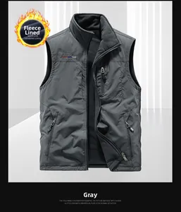 Close-up of windproof gray vest with fleece lining and freedom embroidery detail