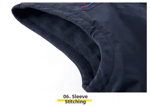 Close-up of durable armhole stitching and warm black fleece lining on navy vest