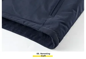 Detail of the hem workmanship with windproof fabric and warm fleece lining of the vest
