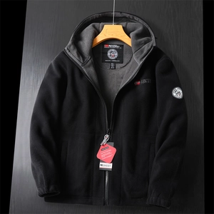 Detailed close-up of men's winter hooded fleece jacket with warm double-layer lining