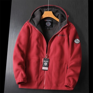 Close-up of red thick double-layer fleece jacket with Norway flag and hood detail
