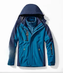 Detail of a 3-in-1 outdoor jacket with waterproof zippers and blue color blocking