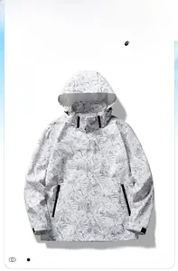 Detail of leaf pattern camo print on windproof hooded jacket for outdoor hiking