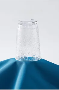 Detail showing breathable fabric of outdoor jacket with visible condensation and moisture removal