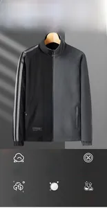 Detail of reversible fleece jacket showing stand collar and double-sided thermal fabric