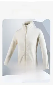 Close-up of detachable white polar fleece liner with thermal heat retention texture