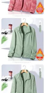 Detail of pink and green fleece jackets with thick thermal lining and full zipper
