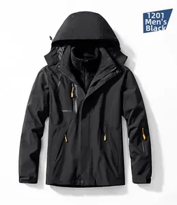 Detail of men's black 3-in-1 waterproof jacket with orange contrast zipper and fleece liner