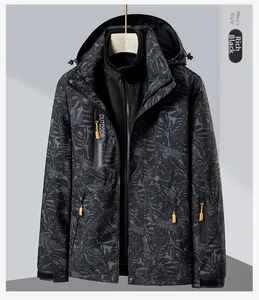 Close-up of a men's waterproof camouflage outdoor jacket with orange zipper details