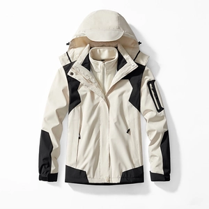 Veste outdoor imperméable avec capuche en design color-block crème et noir pour l'automne