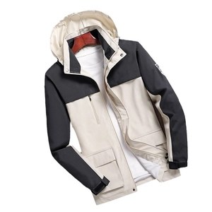 Waterproof outdoor hooded jacket in black and white colorblock with multi-pockets design