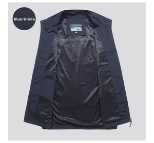 Detail view of the breathable blue mesh lining and interior label on the outdoor vest