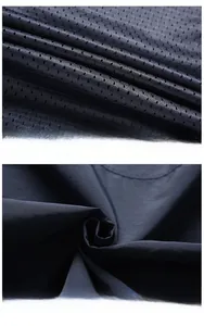 Detail showing breathable mesh lining and smooth water-resistant fabric of the vest