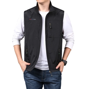 Men's black multi-pocket utility vest with V-neck zipper and embroidered chest detail