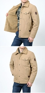 Detail of men's khaki work jacket featuring thick sherpa lining and embroidery