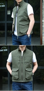 Detail view of olive green outdoor vest featuring four large pockets and embroidery