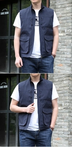 Detailed view of deep blue multi-pocket outdoor vest with stand collar and embroidery