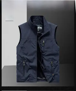 Detail of deep blue outdoor vest with multiple zipper pockets and mesh lining