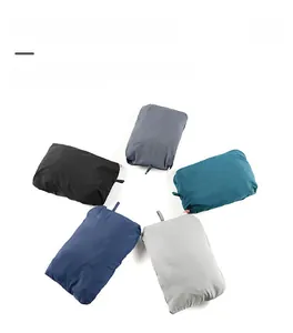 Foldable sun protection jackets in five colors showing compact portable storage design