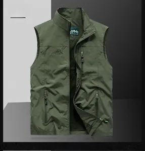 Detail of army green outdoor vest showing zip pockets and outdoor embroidery design