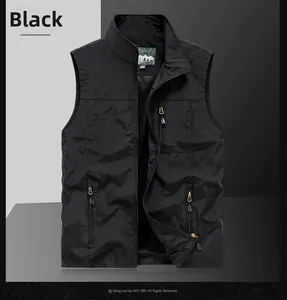 Detail of black outdoor vest showing stand collar, metal zipper, and outdoor embroidery