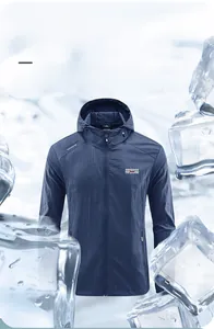 Detailed view of navy blue hooded cooling jacket surrounded by ice blocks for sun protection