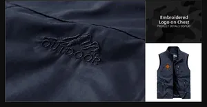 Close-up of high-quality chest embroidery with mountain logo on navy blue outdoor vest