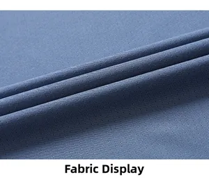 Macro detail of blue ice silk fabric featuring breathable micro-mesh texture for sportswear