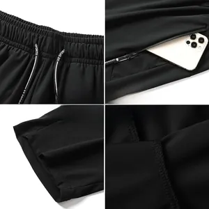 Detailed views of men's quick-dry sports pants with elastic waist and zipper pockets