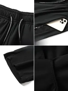 Detail of quick-dry black sports pants featuring drawstring waist and hidden zipper pockets
