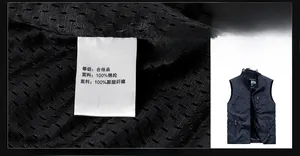 Detail of the breathable mesh lining and 100% nylon material label for the outdoor vest