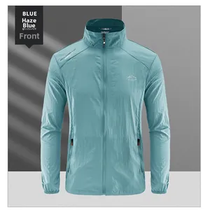 Front detail of haze blue sun protection jacket with zip pockets and elastic cuffs