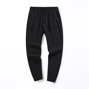 Pantalon en soie glacée noire pour homme avec taille élastique et coupe fuselée sport