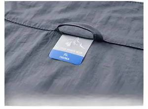 Detailed close-up of the sun protection jacket collar with high-quality XL size label