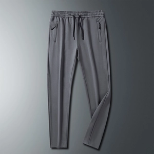 Men's ice silk quick-dry casual pants in grey with elastic waist and zipper pockets