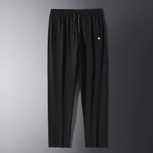Pantaloni sportivi neri da uomo con coulisse e dettaglio nastro tricolore laterale