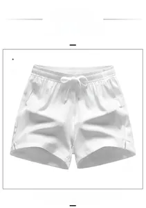 Detail view of white drawstring elastic waistband and soft cotton fabric of the shorts