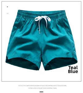 Detail view of lake blue men's loose fit casual shorts with elastic drawstring waist
