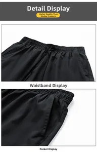 Detail of loose fit shorts featuring elastic waistband and functional side pockets