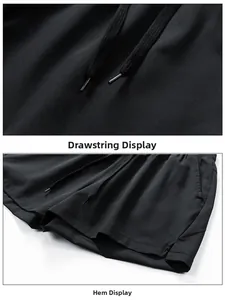 Detail of black athletic shorts featuring adjustable drawstring waist and reinforced stitching