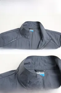 Détail du col montant et de l'étiquette intérieure d'une veste de sport légère