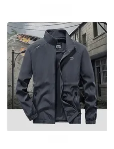 Close-up of grey outdoor jacket with full-zip front, stand collar and mountain logo detail