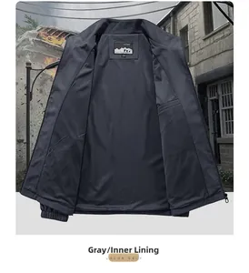 Detail of grey outdoor jacket interior featuring functional inner pocket and smooth lining