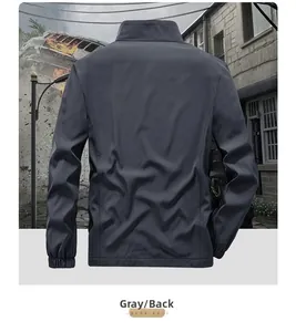 Rear view of dark grey outdoor tactical jacket with windproof fabric and elastic cuffs