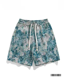 Macro view of blue-green floral jacquard fabric texture and drawstring on men shorts