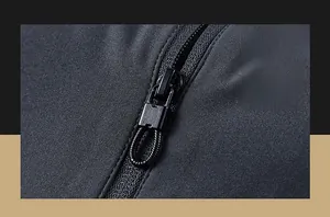 Detail view of durable black matte metal zipper with anti-slip woven nylon cord on jacket